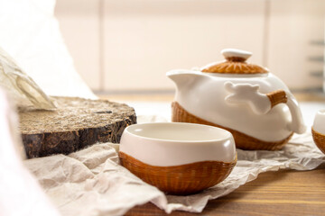 Tea set for making and drinking  on a white background. Teapot and cups, pressed black tea. Tea...
