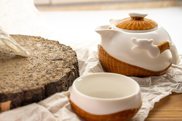 Tea set for making and drinking  on a white background. Teapot and cups, pressed black tea. Tea...