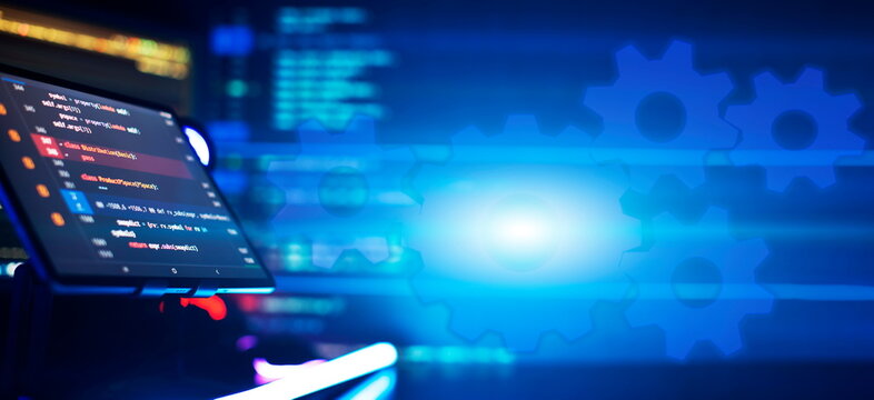 Writing programming code on laptop. Software source code. Programming code. Abstract IT technology background.