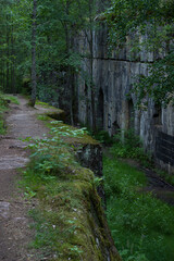Abandoned stone ammunition storage cellar from 1916 in the forest. Monrepos Park. Vyborg.