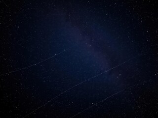 Fototapeta premium Majestic star field in the vastness of deep space, with countless stars shining brightly against a dark background, astronomy, galaxy