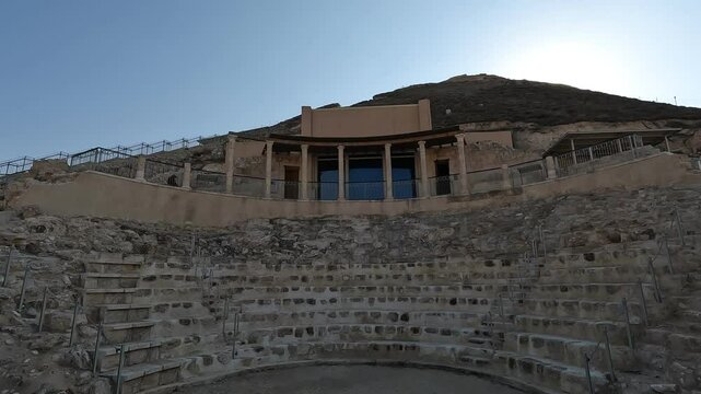 A clear, sunny day reveals the small amphitheater ruins at Herodium, an ancient site of historical and archaeological significance in Israel.