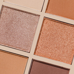 Fototapeta premium Cosmetics texture pattern, makeup palette vivid neutral color eye shadow, square eye powder swatches. Female cosmetic and beauty products, aesthetic minimal beauty photo, colorful eyeshade, top view