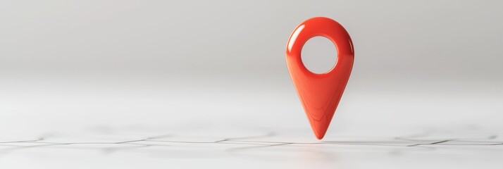 Fototapeta premium Glossy red location marker standing out on a clean white background with subtle shadows