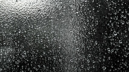 Raindrops on the window glass background 