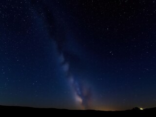 Fototapeta premium A breathtaking meteor shower lights up the starry night sky, creating a spectacular celestial display, night sky, celestial bodies
