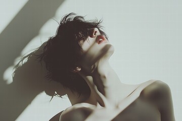 Serene Portrait of a Young Woman with Striking Shadow Play