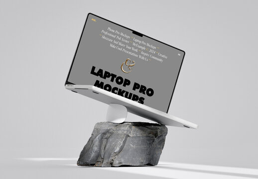 Laptop Pro Supported By The Mouse On Stone Mockup