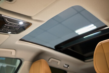 The interior design of a modern car sunroof incorporates sleek aesthetics and innovative features