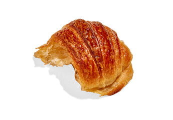 A golden, flaky croissant with a beautifully glossy crust. The delicate layers of buttery pastry are visible, highlighting its airy and crisp texture, perfect for breakfast or a snack.
