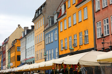 Fototapeta premium typical colorful houses in the area called nyhavn in the city of copenhagen which is the capital of denmark in europe