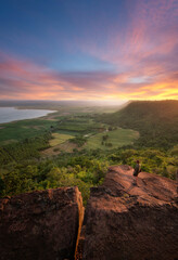 Breathtaking view of Thailand's countryside featuring lush green rice fields. The tranquil rural landscape showcases the natural beauty and traditional charm of Southeast Asia, perfect for nature.