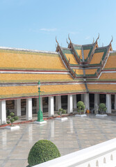 A minimalist-style image of a traditional Thai temple, showcasing clean architectural lines and a simple yet elegant design.