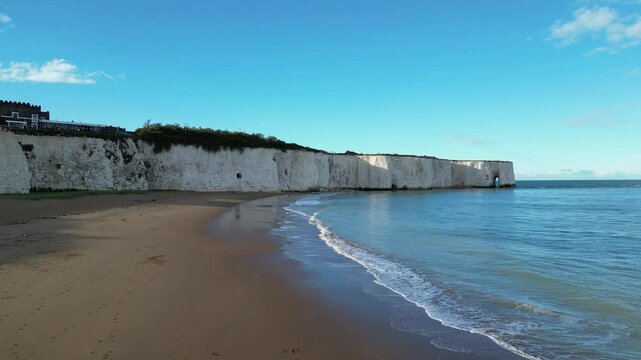 Drone footage of Kingsgate Bay Beachon a sunny day in Broadstairs, Kent, England, United Kingdom