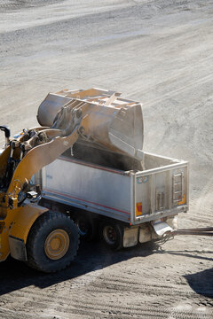 Front end loader loading a truck in mine