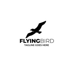 Fototapeta premium Flying bird logo icon flat vector design