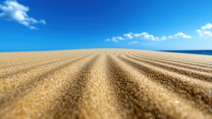 A beach scene with a blue sky and a few clouds