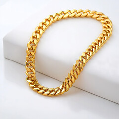 Obraz premium Gold Cuban link bracelet, thick and wide chain