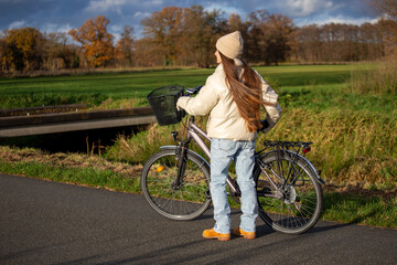 Woman Riding Bicycle, Natural Skin, Exploring Outdoors, Enjoying Nature
