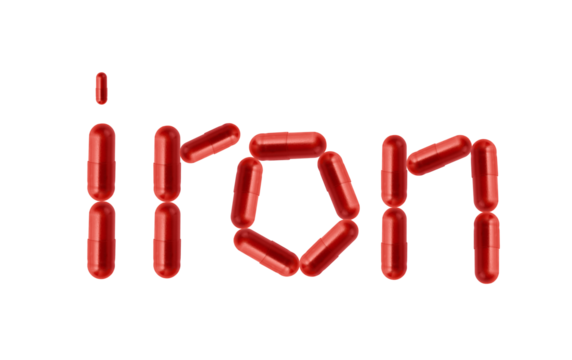 Creative idea for iron anemia concept. Supplement of ferritin in red capsule isolated on transparent background. Word with capsule representing iron supplementation for treating iron anemia.