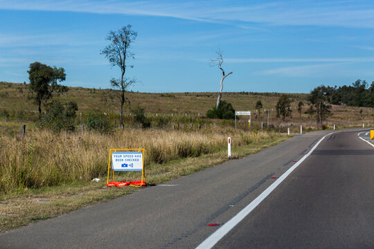 Your speed has been checked sign beside highway road