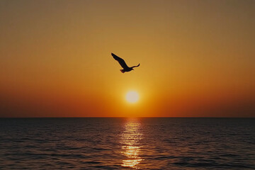 Fototapeta premium Serene Sunset Over Ocean With Bird Silhouetted Against Orange Sky, copy space