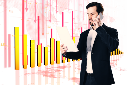 Man in suit holding papers and talking on phone, standing in front of financial charts, red arrows pointing down, concept of market loss - Powered by Adobe