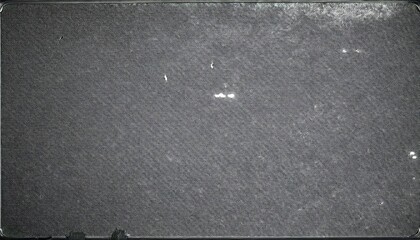 Detailed Close-Up of a Gray Textured Fabric Surface Showing Small Scuffs and Imperfections, Ideal for Analyzing Wear Patterns, Industrial Material Design, or Textile Quality Control Studies