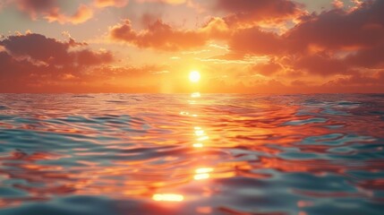 Obraz premium Vibrant sunset over calm ocean waters.