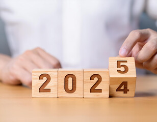 New project growth concept in 2025, Preparation for happy new year , Hand of man flip wooden