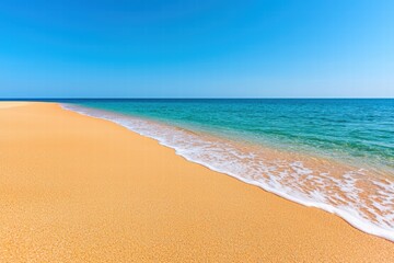 Fototapeta premium Serene beach with golden sand and clear waters