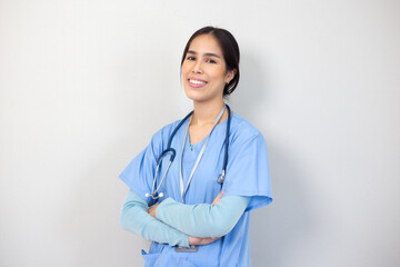 Portrait of young asian nurse in the white room, healthcare workers concept.