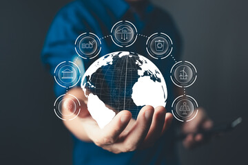 A hand holds a glowing globe surrounded by icons representing environment, energy, and care,...