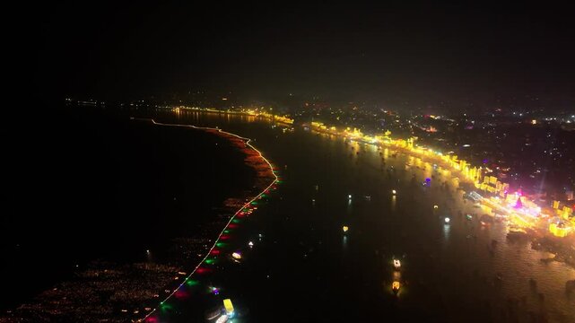 Dev Diwali in Banaras: Nighttime Drone View of Ganga River, Glowing Ghats, and Boats