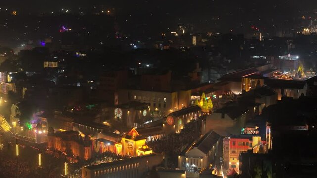 Night View of Dev Diwali in Kashi: Ganga River and Glowing Ghats from Above