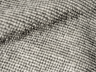 Macro photography of fabric texture, detailing soft waves and patterns, creating an impression of...