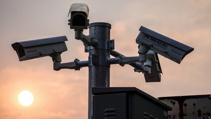 Fototapeta premium cameras on the pole staring ahead monitor the surroundings