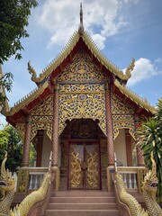 Naklejka premium Outside a beautiful, ornate temple (Chiang Mai Thailand)