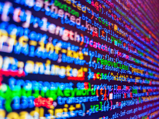 Software computer programming code and circuit board abstract technology background. Wooden tulip...