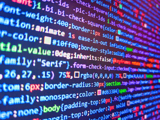 Abstract background of digital binary code of software. Software development by programmer. Monitor technology concept. Software development pattern. Code on monitor. Blue unique background.