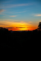 Obraz premium Sunrise with intense natural orange lights and idyllic dramatic scenery