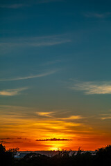 Sunrise with intense natural orange lights and idyllic dramatic scenery