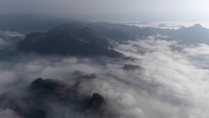 Clouds on high mountain peaks in the rainy season in the Asian rainforest..