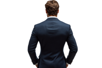 A confident businessman standing with hands on hips, showcasing a well-tailored suit against a white isolated background.