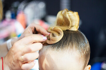 stylist to create a fashionable ponytail hairstyle for a ballroom dancing tournament. Non-Olympic...