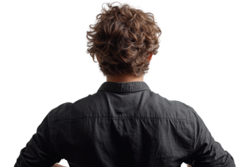 A young man with curly hair, wearing a black shirt, poses with his hands on hips. Isolated on a white background for a striking visual impact.