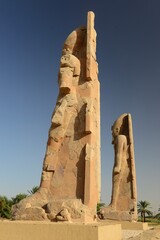 Temple of Mereptah, Luxor City, Egypt, Africa. The colossus pharoah statues of a temple.