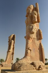 Temple of Mereptah, Luxor City, Egypt, Africa. The colossus pharoah statues of a temple.