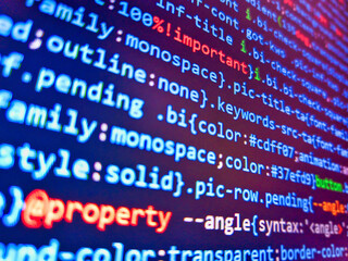 Parking sign, background. Programming code on computer screen. Screen of code for overlay background. Binary code. Smile its fridaydigits on the screen. Virus in program code. Encrypted data.