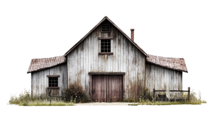 Old rustic barn with weathered wood and overgrown grass, white isolated background.